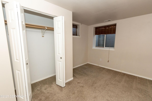 10127 Crest View Ln, Eagle River, AK 99577 - unfurnished bedroom featuring carpet, visible vents, a closet, and baseboards