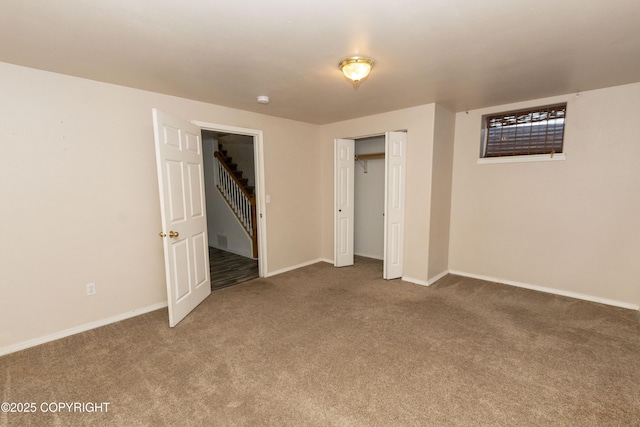 10127 Crest View Ln, Eagle River, AK 99577 - unfurnished bedroom with a closet, baseboards, and carpet