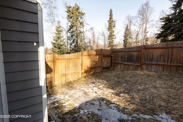 10127 Crest View Ln, Eagle River, AK 99577 - view of yard with a fenced backyard