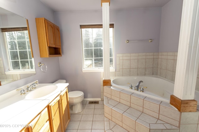 10127 Crest View Ln, Eagle River, AK 99577 - full bathroom featuring visible vents, a bath, toilet, vanity, and tile patterned flooring