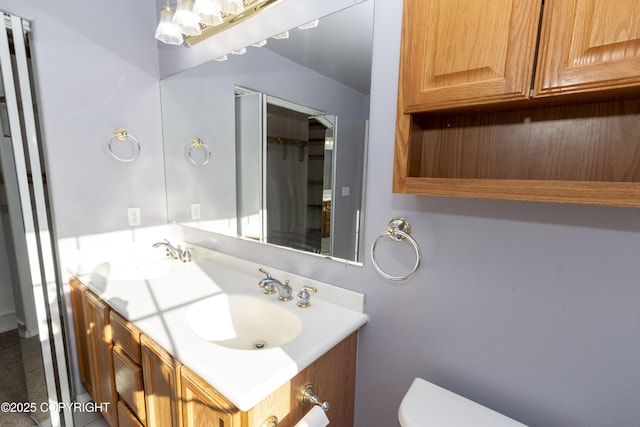 10127 Crest View Ln, Eagle River, AK 99577 - full bathroom with a sink, toilet, and double vanity