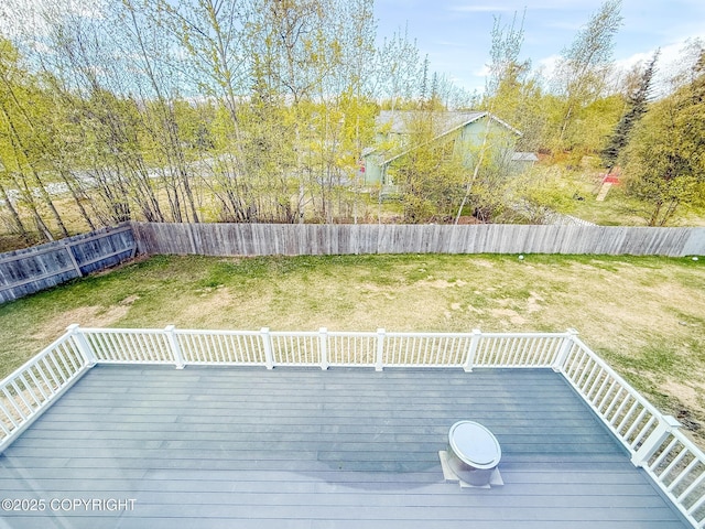 2731 E Tamarak Ave, Wasilla, AK 99654 - wooden terrace featuring a fenced backyard