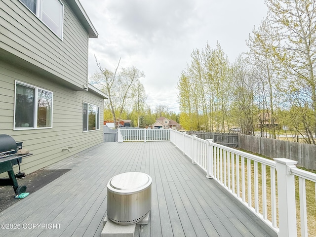 2731 E Tamarak Ave, Wasilla, AK 99654 - deck featuring a fenced backyard and a grill