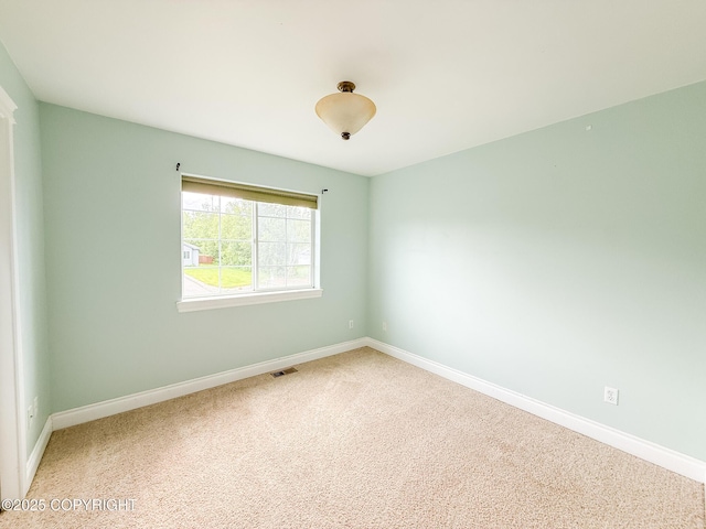 2731 E Tamarak Ave, Wasilla, AK 99654 - empty room with carpet and baseboards