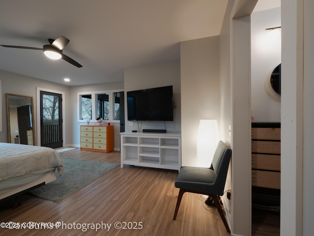 11730 Broadwater Dr, Eagle River, AK 99577 - bedroom with wood finished floors and a ceiling fan
