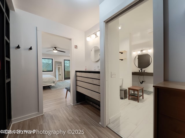 11730 Broadwater Dr, Eagle River, AK 99577 - hallway with wood finished floors