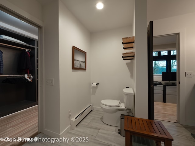 11730 Broadwater Dr, Eagle River, AK 99577 - bathroom with baseboard heating, toilet, baseboards, and recessed lighting
