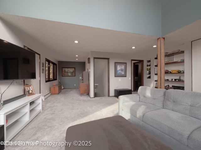 11730 Broadwater Dr, Eagle River, AK 99577 - carpeted living area with baseboard heating, recessed lighting, and ornate columns