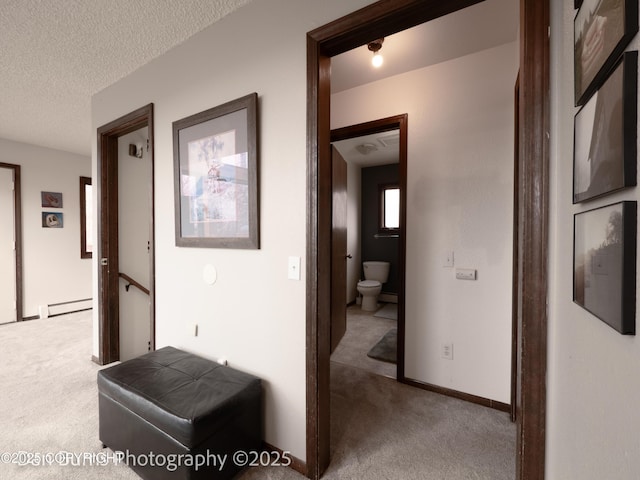 11730 Broadwater Dr, Eagle River, AK 99577 - hall with carpet flooring, a baseboard heating unit, a textured ceiling, and baseboards