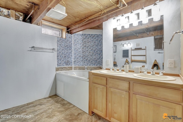 4303 E 3rd Ave, Anchorage, AK 99508 - full bath with a sink, a tub to relax in, and double vanity