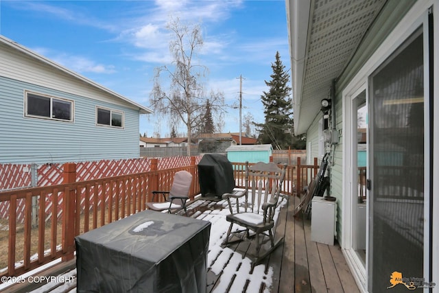 4303 E 3rd Ave, Anchorage, AK 99508 - deck featuring a grill and fence