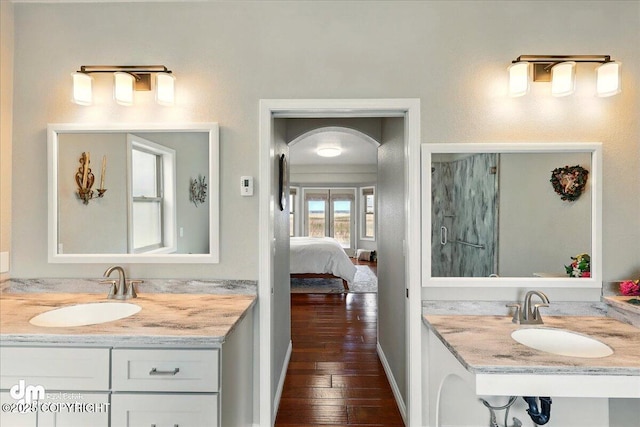 47366 Winridge Ave, Kenai, AK 99611 - full bath with hardwood / wood-style flooring, vanity, and connected bathroom