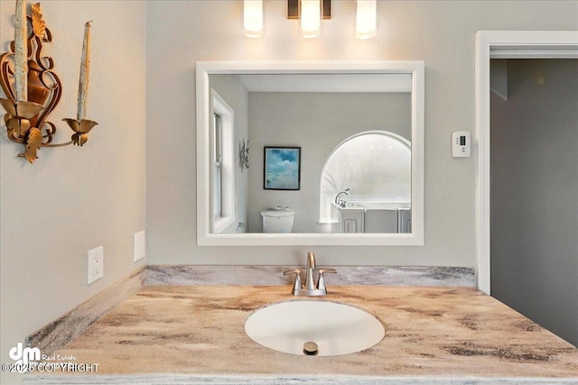 47366 Winridge Ave, Kenai, AK 99611 - bathroom with vanity and toilet