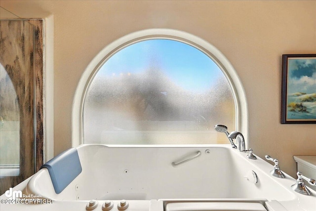 47366 Winridge Ave, Kenai, AK 99611 - bathroom with a tub with jets
