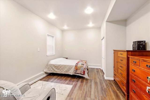 47366 Winridge Ave, Kenai, AK 99611 - bedroom with dark wood-style flooring and baseboards
