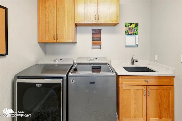 47366 Winridge Ave, Kenai, AK 99611 - laundry area with washer and clothes dryer and cabinet space