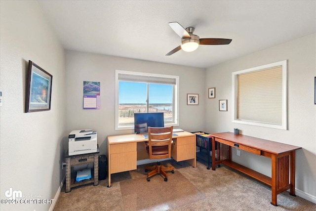 47366 Winridge Ave, Kenai, AK 99611 - home office with light carpet, a ceiling fan, and baseboards