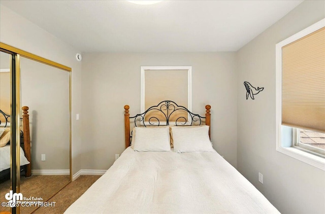 47366 Winridge Ave, Kenai, AK 99611 - carpeted bedroom with a closet and baseboards