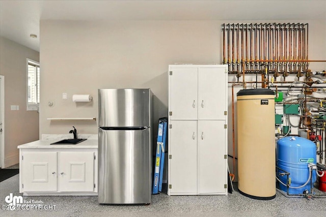 47366 Winridge Ave, Kenai, AK 99611 - utility room featuring water heater and a sink