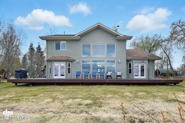 47366 Winridge Ave, Kenai, AK 99611 - rear view of house with french doors, a deck, and a lawn