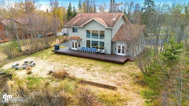 47366 Winridge Ave, Kenai, AK 99611 - rear view of house with french doors and a deck