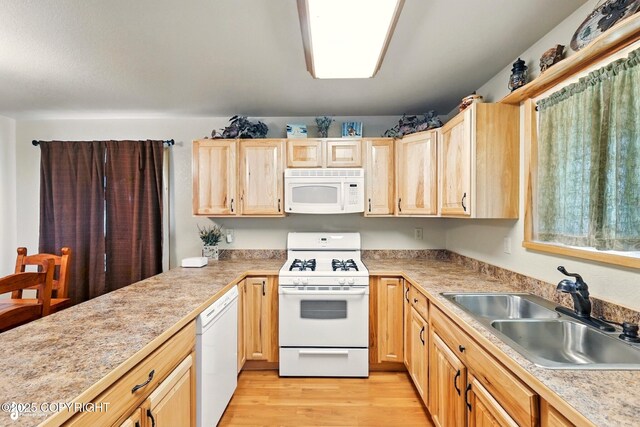 22045 Becharof Cir, Kasilof, AK 99610 - kitchen with white appliances, a sink, light countertops, and light brown cabinetry