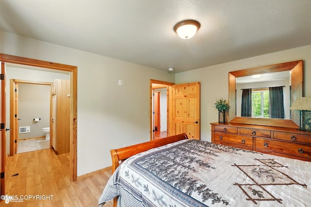 22045 Becharof Cir, Kasilof, AK 99610 - bedroom with light wood-type flooring and baseboards