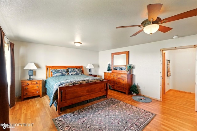 22045 Becharof Cir, Kasilof, AK 99610 - bedroom featuring light wood-type flooring and ceiling fan