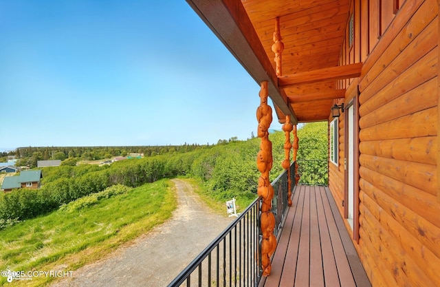 22045 Becharof Cir, Kasilof, AK 99610 - wooden terrace with agricultural plots and a view of countryside