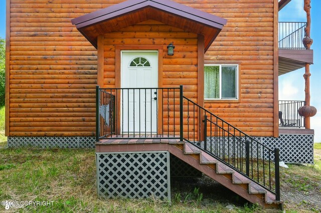 22045 Becharof Cir, Kasilof, AK 99610 - entrance to property featuring log veneer siding