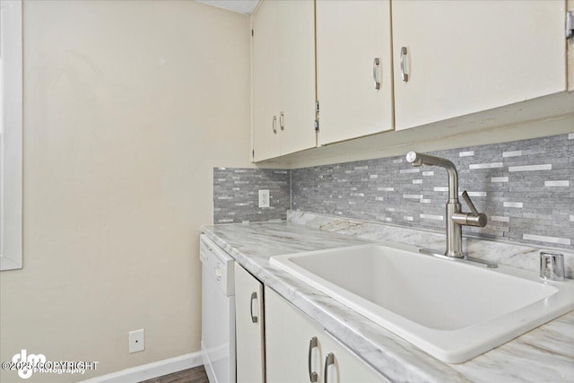 3936 W 88th Ave, Anchorage, AK 99502 - kitchen with a sink, backsplash, light countertops, and dishwasher