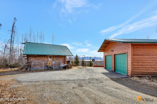detached garage featuring a mountain view