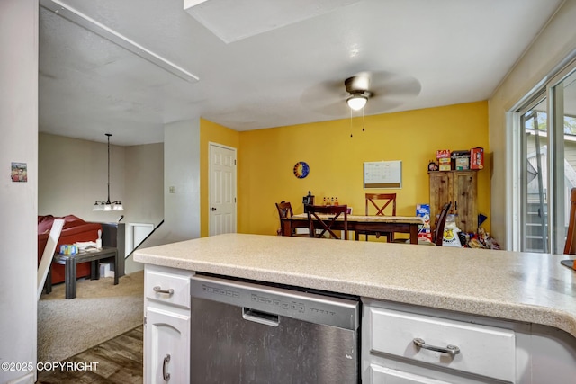 3550 Kachemak Cir, Anchorage, AK 99515 - kitchen with dishwasher, a ceiling fan, wood finished floors, white cabinets, and light countertops
