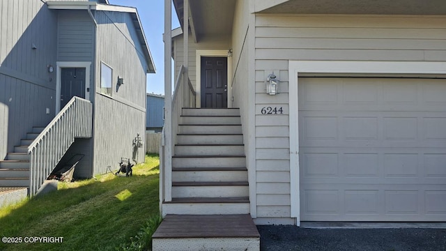 6244 Ophir Dr, Anchorage, AK 99504 - view of exterior entry featuring a lawn