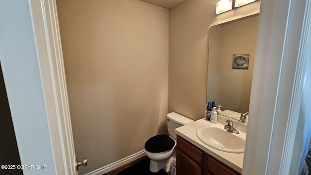 6244 Ophir Dr, Anchorage, AK 99504 - half bath featuring vanity and toilet