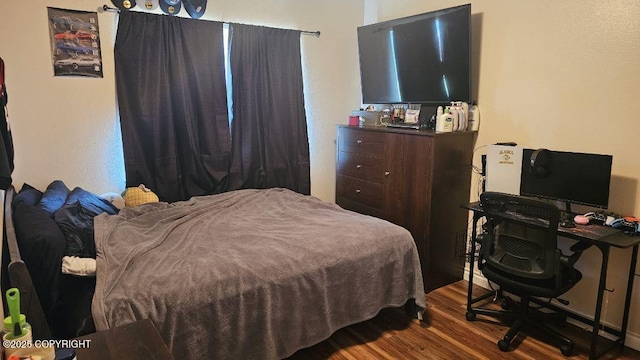 6244 Ophir Dr, Anchorage, AK 99504 - bedroom featuring wood finished floors