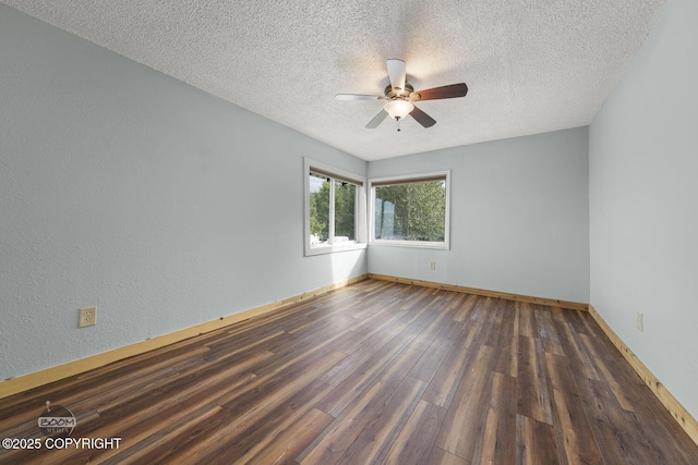 8153 Stewart Mountain Dr, Eagle River, AK 99577 - unfurnished room with wood finished floors, a textured ceiling, ceiling fan, baseboards, and a textured wall