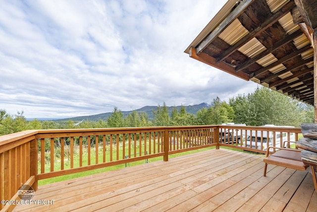 8153 Stewart Mountain Dr, Eagle River, AK 99577 - wooden terrace featuring a mountain view