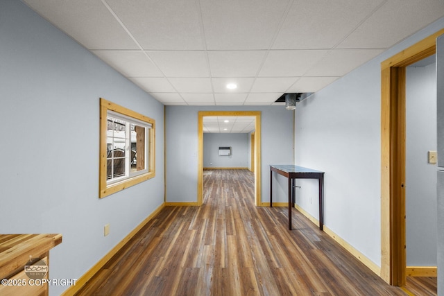 8153 Stewart Mountain Dr, Eagle River, AK 99577 - hall featuring wood finished floors, a paneled ceiling, baseboards, and recessed lighting