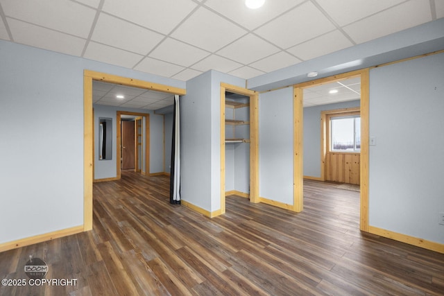 8153 Stewart Mountain Dr, Eagle River, AK 99577 - empty room featuring a paneled ceiling, baseboards, dark wood-style flooring, and recessed lighting