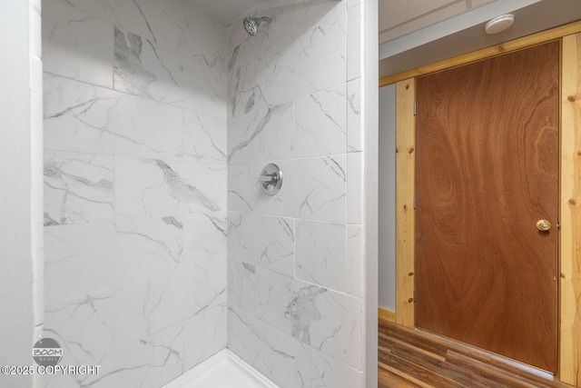 8153 Stewart Mountain Dr, Eagle River, AK 99577 - bathroom with tiled shower and wood finished floors