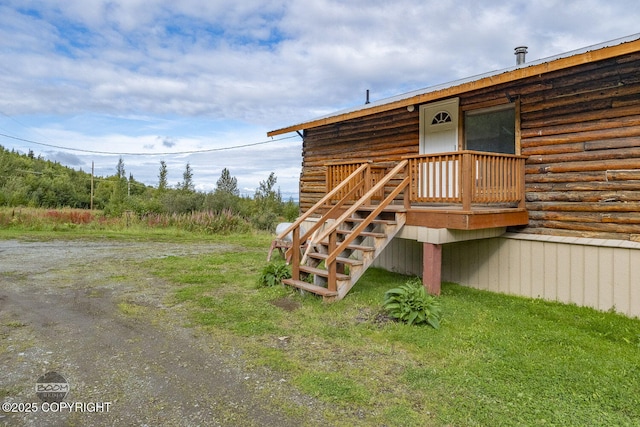 8153 Stewart Mountain Dr, Eagle River, AK 99577 - exterior space featuring stairway and a wooden deck