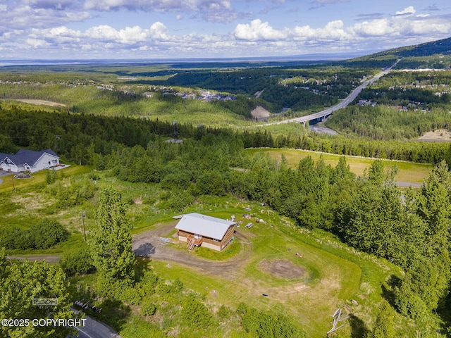 8153 Stewart Mountain Dr, Eagle River, AK 99577 - aerial view of property's location featuring a heavily wooded area