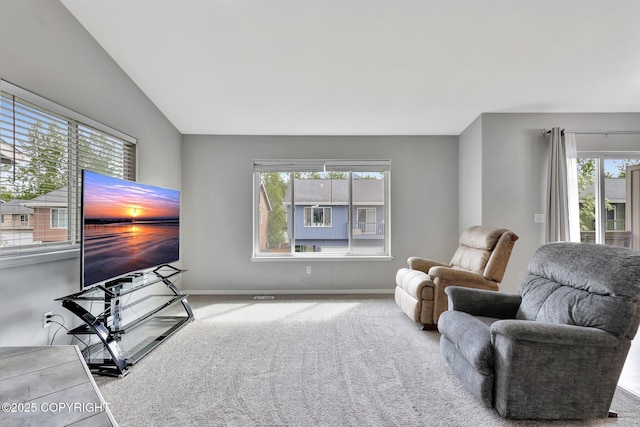 2460 Lochenshire Pl Unit 21, Anchorage, AK 99504 - sitting room featuring carpet floors and baseboards