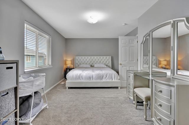 2460 Lochenshire Pl Unit 21, Anchorage, AK 99504 - carpeted bedroom featuring baseboards