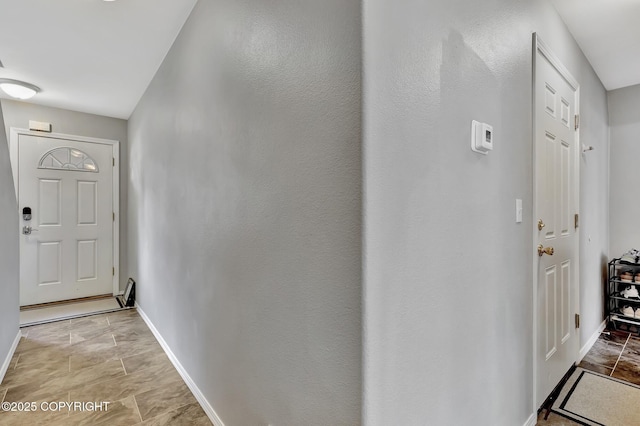 2460 Lochenshire Pl Unit 21, Anchorage, AK 99504 - entryway featuring baseboards