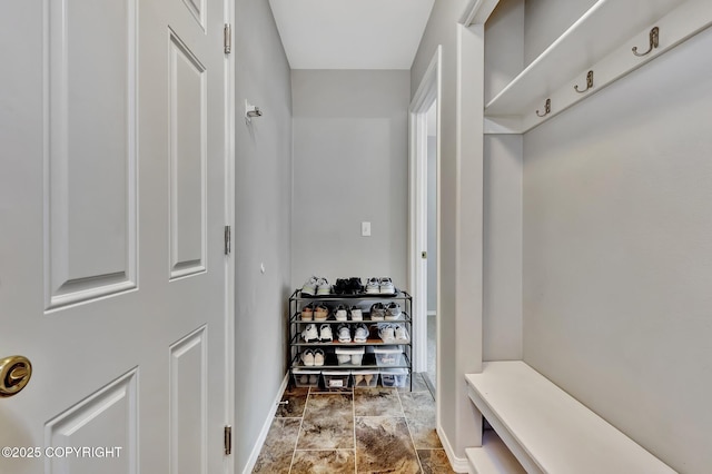 2460 Lochenshire Pl Unit 21, Anchorage, AK 99504 - mudroom with baseboards