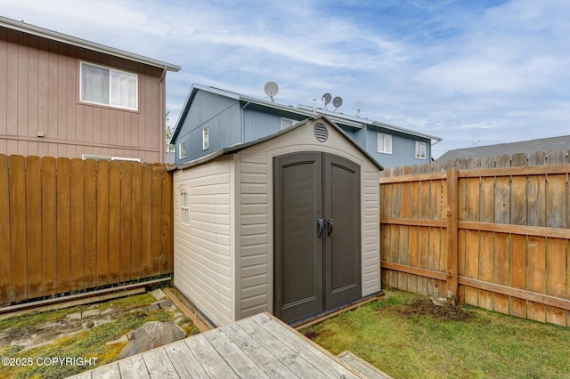 2460 Lochenshire Pl Unit 21, Anchorage, AK 99504 - view of shed featuring a fenced backyard