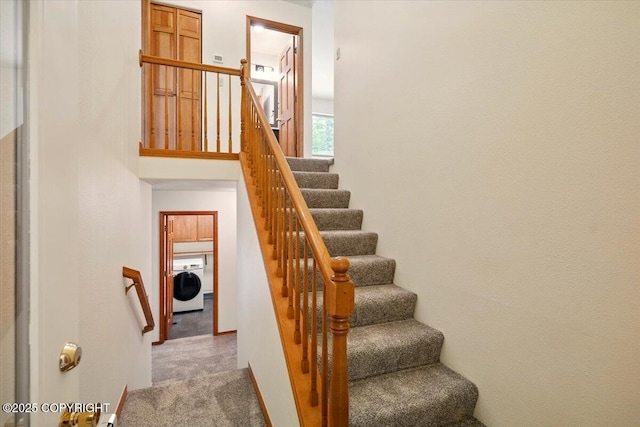 22309 Knik Vista St, Chugiak, AK 99567 - stairway featuring washer / clothes dryer and carpet flooring
