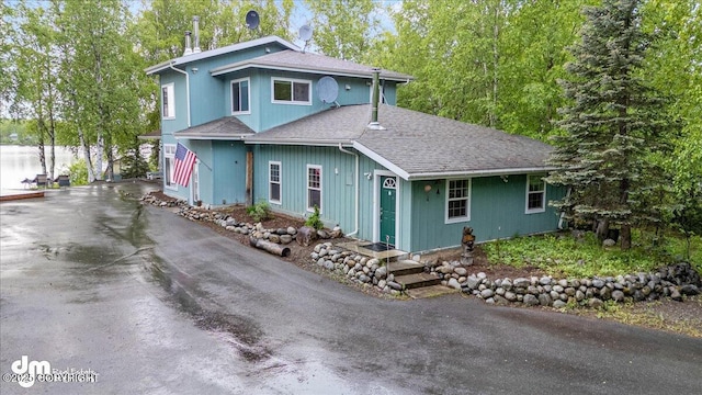 13598 N Willow Dr, Willow, AK 99688 - view of front of house with a shingled roof and driveway
